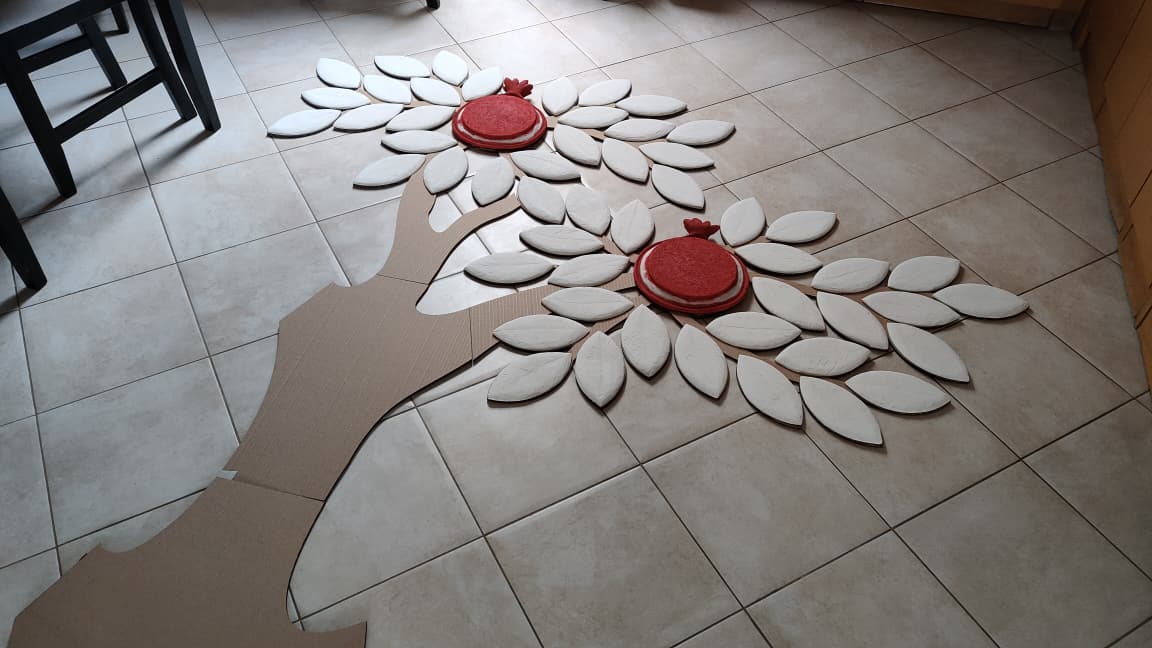 Full tree composition dry-fitted on the workshop floor before painting and mounting